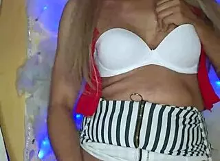 beautiful made-up transvestite shows off her stunning look!