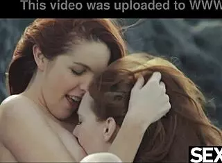 Two Redheads Enjoy Beach Time Together