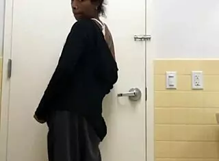 STRIP TEASE out her SWEATS in PUBLIC BATHROOM