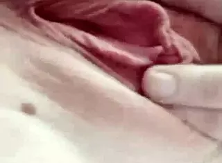 alura marie baker looks horny as she plays with her tits and pussy.