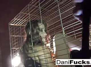 Sexy Dani Daniels in a cage for solo play