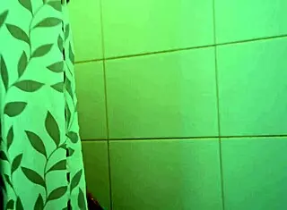 I'm watching my skinny blonde girl bathing in the homemade shower