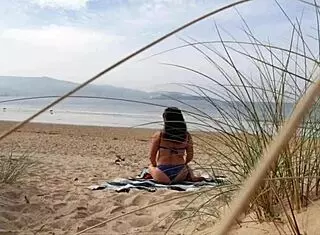 i filmed a curvy milf stripping naked and working out her big ass on the beach