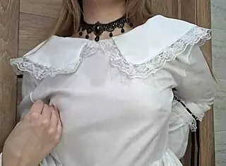 doll in a delicate dress and stockings, looking so pretty