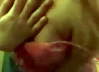 teen blonde undresses in webcam striptease, ripping clothes to show pussy