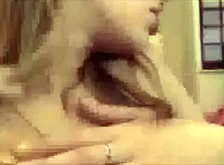 teen blonde undresses in webcam striptease, ripping clothes to show pussy