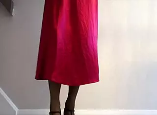 My sexy red satin skirt hides a slutty wife with stockings and panties.