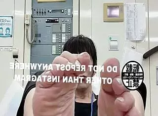 japanese woman shows her feet at the office, indulging in a subtle fetish