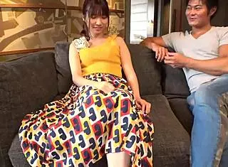 The Asian amateur showcases her small tits in an intimate scene