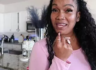 Latina ebony babe bent over in doggystyle with cum on big tits and ass piercing