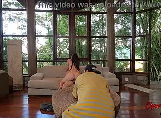 fucking in front of the photographer, bent over doggystyle with a big cock.