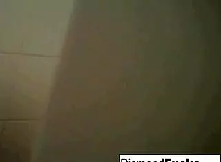 Diamond masturbates with big tits in the wet shower.