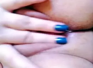 Look at her rubbing her pussy until it drips!