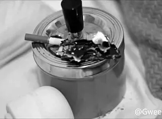 Brazilian Pornstar Smokes Cigarette On Dollar Bill In Greed Fetish Scene