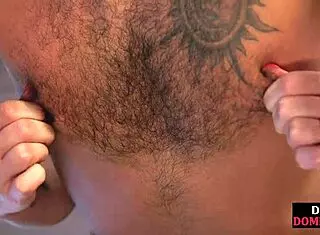 Lingerie domme intensely spanks bound subject with heels and stockings