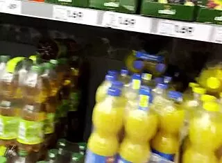 In the supermarket, she helps a guy with a big cock get a risky public cumshot through handjob and spitting