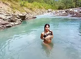 ts angelique cums hard in tropical river setting. her outdoor solo in costume captivates every viewer.