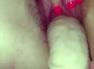she moans as i fill her tight pussy with gigantic dildo