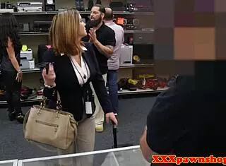 Busty pawnshop milf sucks out back of store on hidden cam