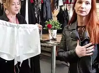 Bettie ballhaus showcases her natural big tits in tight leather pants