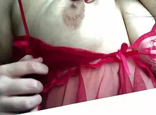 Sexy brunette shows off her big tits solo