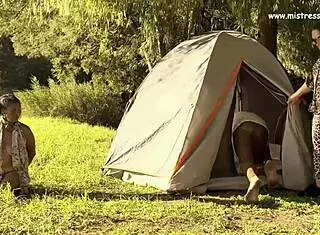 In this hardcore scene, Mistress April dominates bound ebony partners. She deepthroats and fucks in a threesome with sucking and bondage.