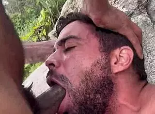 Guys fucking bareback on the beach in outdoor scene