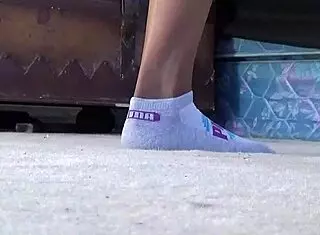 these puma socks on her feet