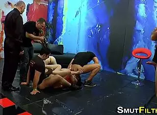 bukkake performer in backstage hardcore scene