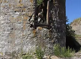 Nude photoshoot unfolds at abandoned military base on Totleben Island.