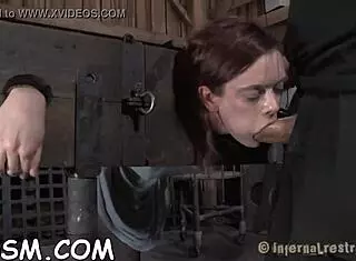 Brunette babe engulfs hard toy weenie in wild fetish play with slave