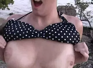 Flashing teen blonde STRIPS in bikini at public beach