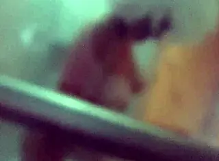 A petite teen jerks his cock while he bathes outdoors