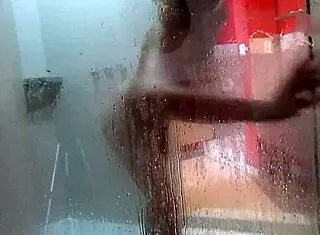 A petite teen jerks his cock while he bathes outdoors