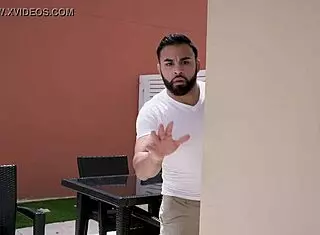 Brandi Bae bends over in a bikini, showing her big tits and perfect ass.