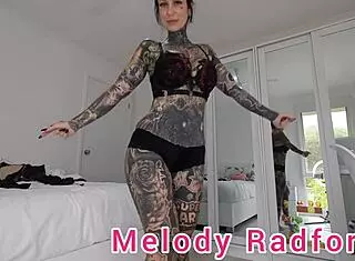 melody radford tries on black red lingerie closeup