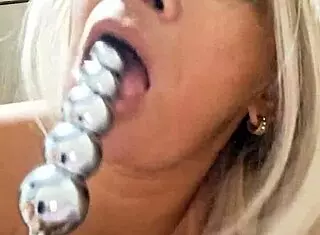 milf plays with ball dildo in naked pussy