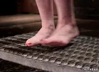 Petite slave's clit is fondled roughly in hogtied bondage