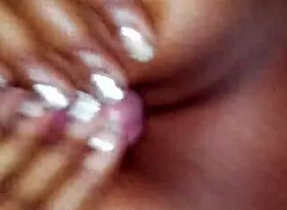 watch this amateur titfuck and blowjob, cumshot all over her tits in interracial fun.