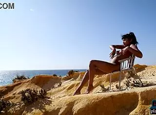 Angel Constance sunbathing outdoors with natural boobs