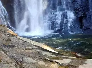 Sex at the brides' veil waterfall with double penetration