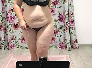 Juicy PAWG shakes in panties, showing chubby MILF figure on webcam.
