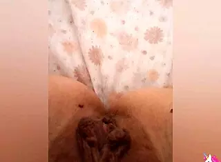 Greta warms under the blanket