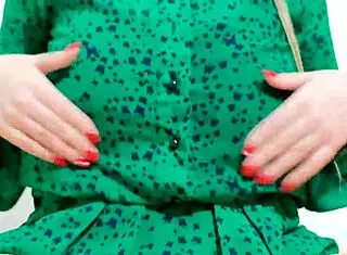 Hot girl strips her dress, moaning loudly.