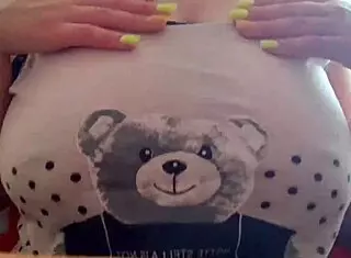 Young Student Teases Big Tits and Nipples Up Close