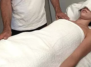 pervert masseur crosses lines with teen during oily massage