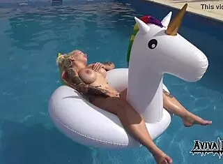 Aviva rocks masturbates on a unicorn, showcasing her big tits and ass with tattoo