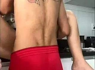 boss forces employee in the kitchen for a quick encounter