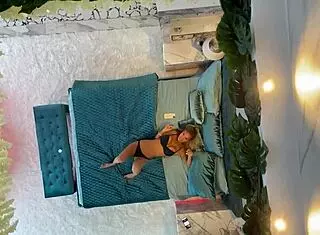 i love watchin monika fox posin naked, her piercd nipples n fake tits lookin hot on da bed