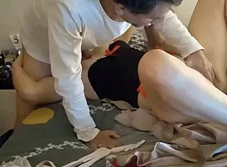 clothed woman in satin lingerie gets licked and fucked doggystyle